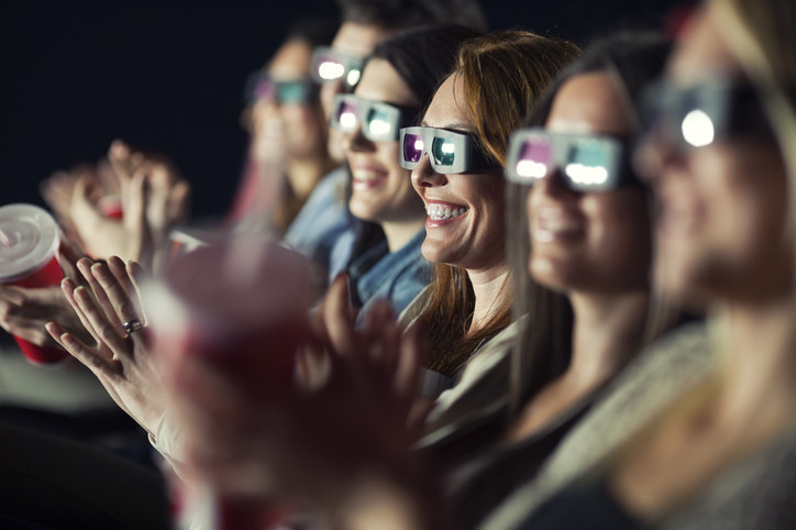 people wearing 3D glasses in a theater