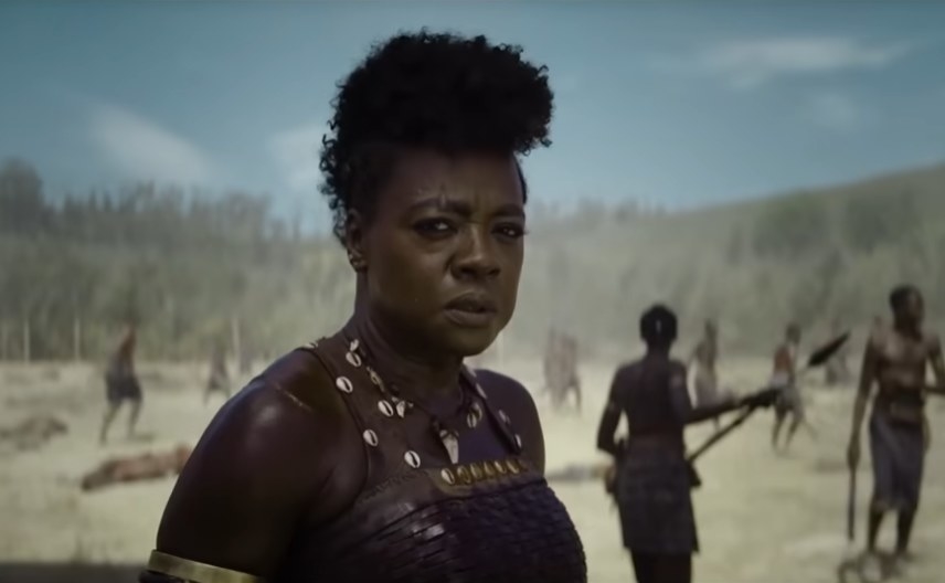 Viola Davis as General Nanisca looking at the aftermath of a battlefield