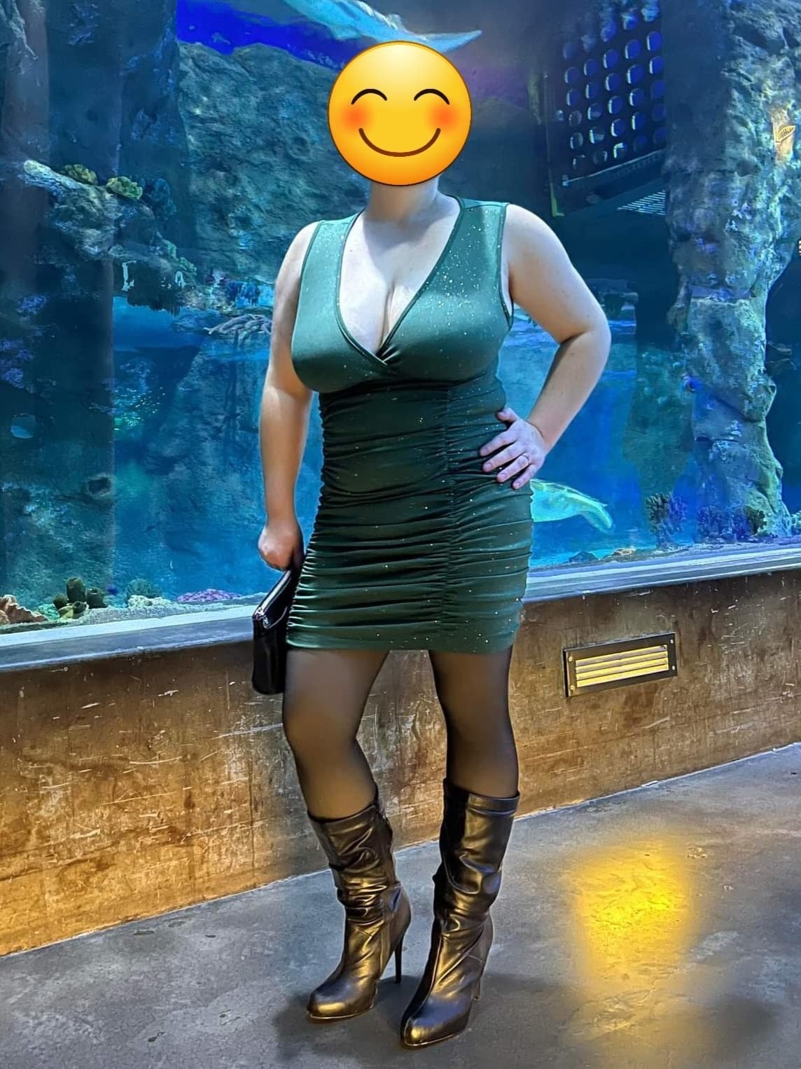 Reviewer wearing cocktail dress with the sheer black tights that look to show skin underneath