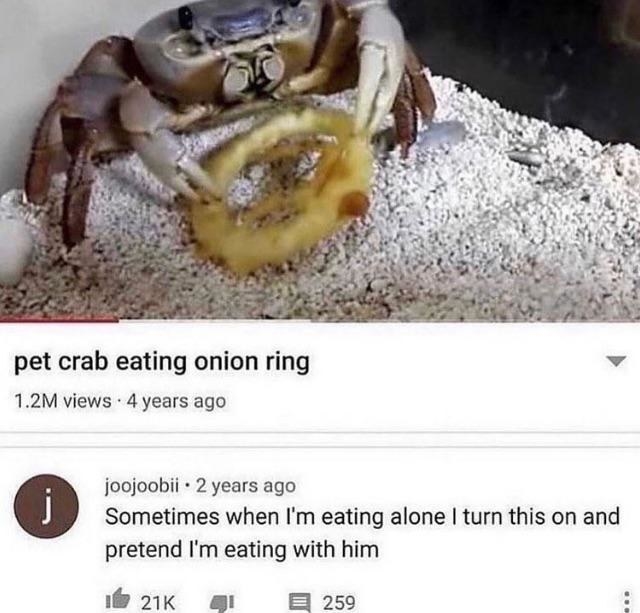person who pretends they are eating onion rings with a crab via a youtube video