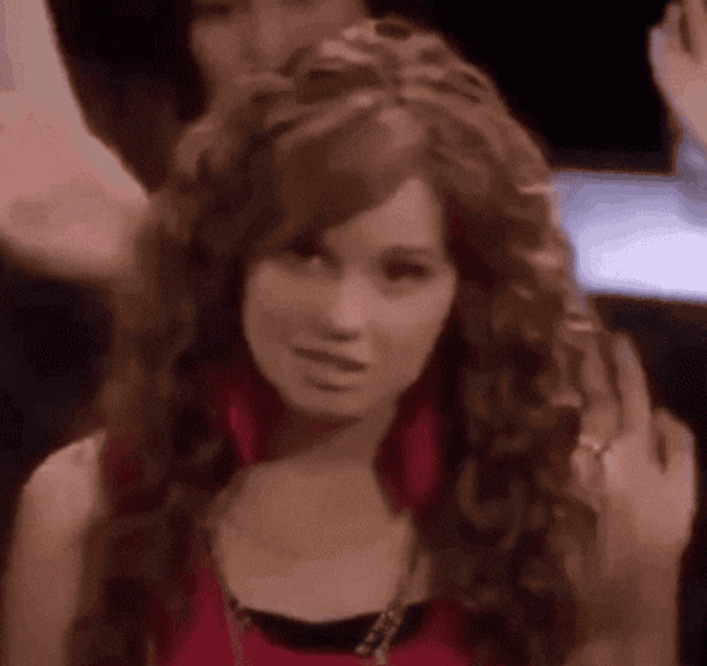 Debby touching her hair