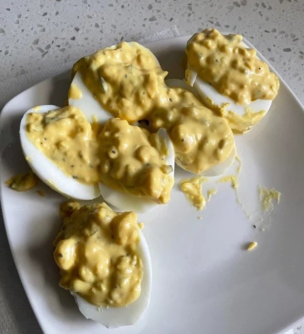 deviled eggs with the filling looking runny
