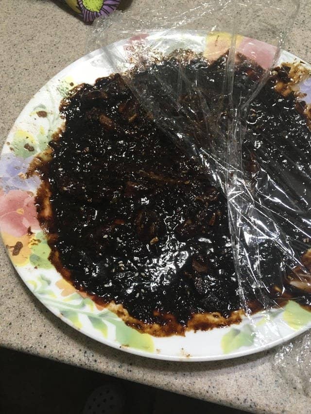a plate with a dark congealed mess on it