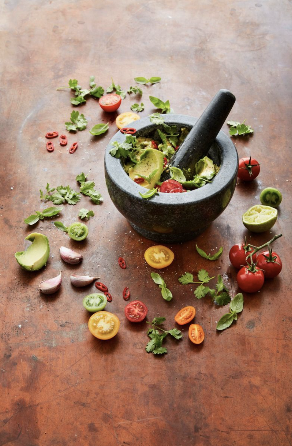 the mortar and pestle making guac