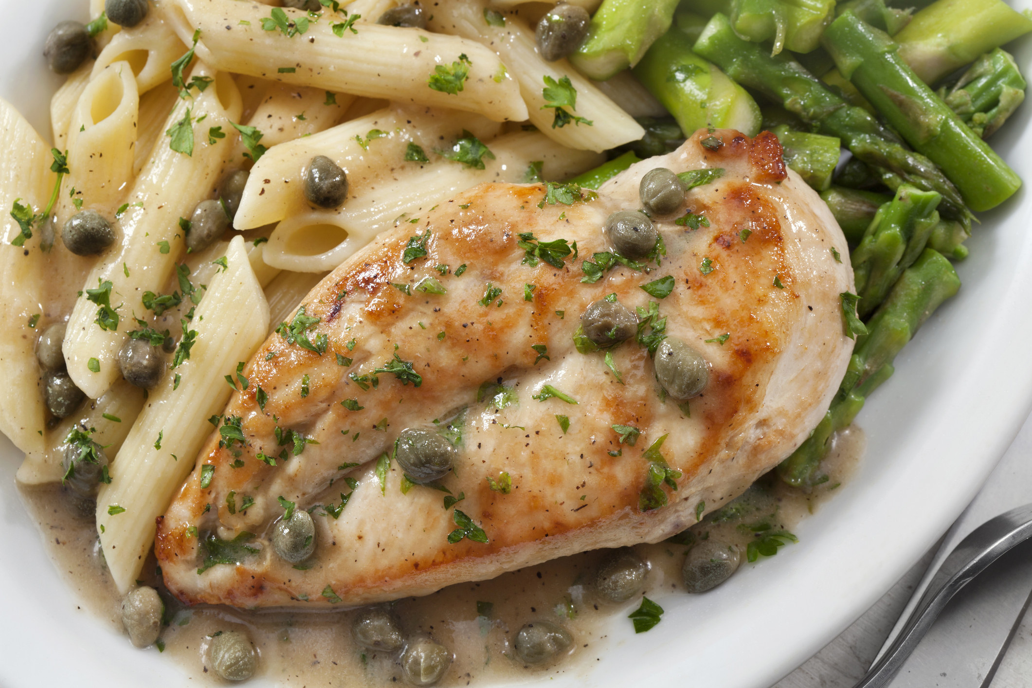 Chicken and penne with caper sauce.