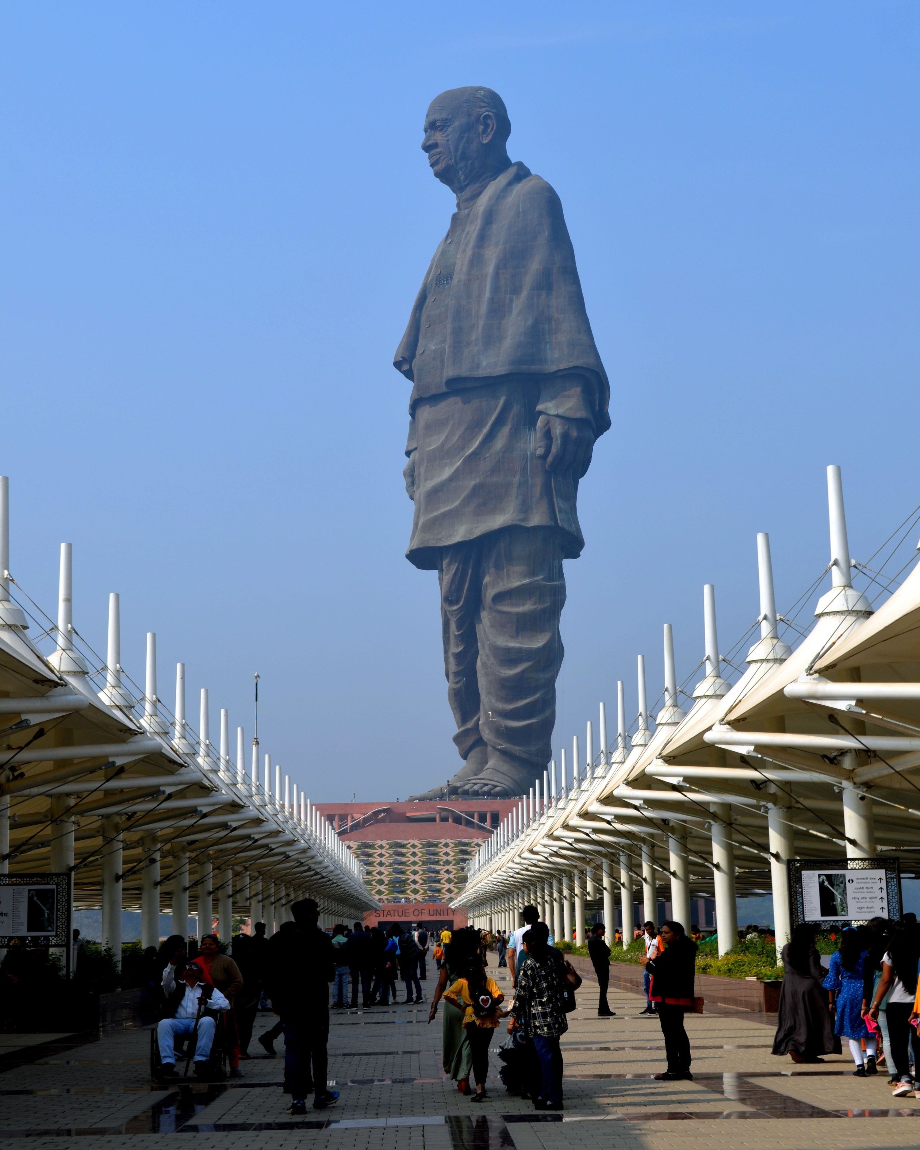 the statue as tall as skyscrapers