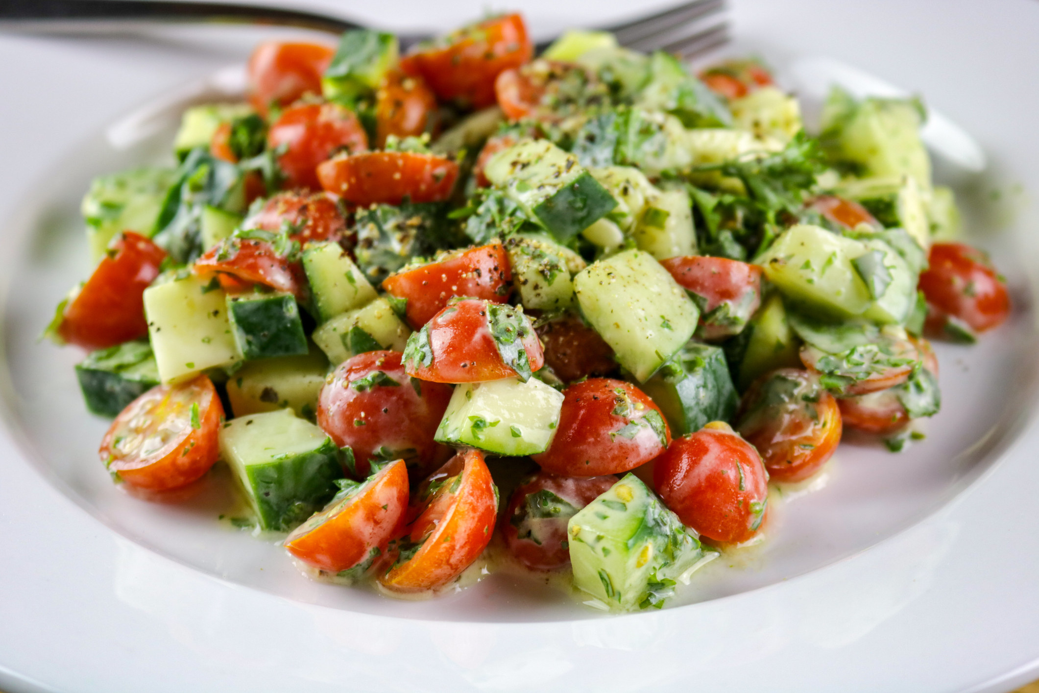 Cucumber, Tomato &amp;amp; Herb Salad with a Creamy Vinaigrette Dressing.