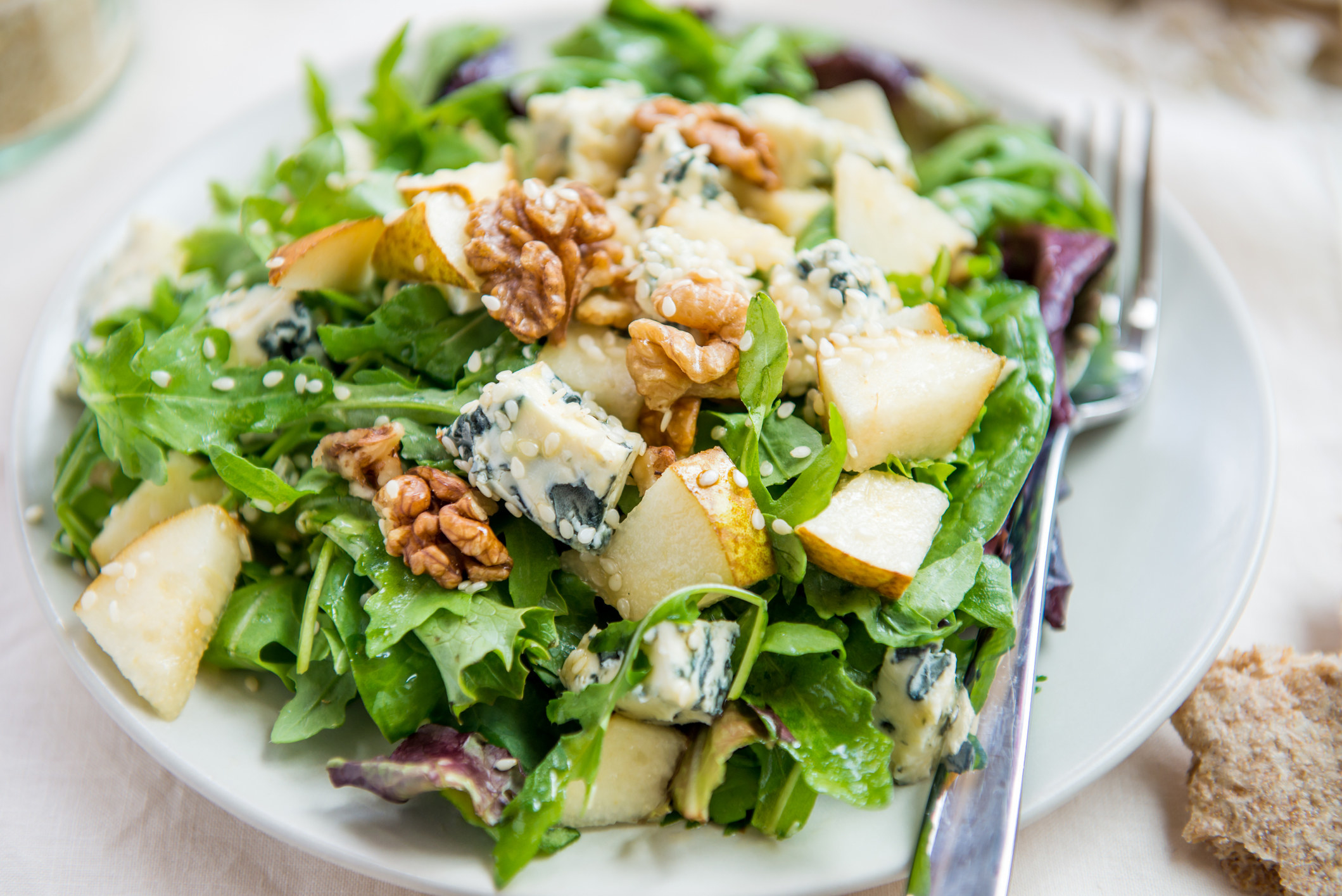 Green salad with pear, walnuts, and blue cheese.