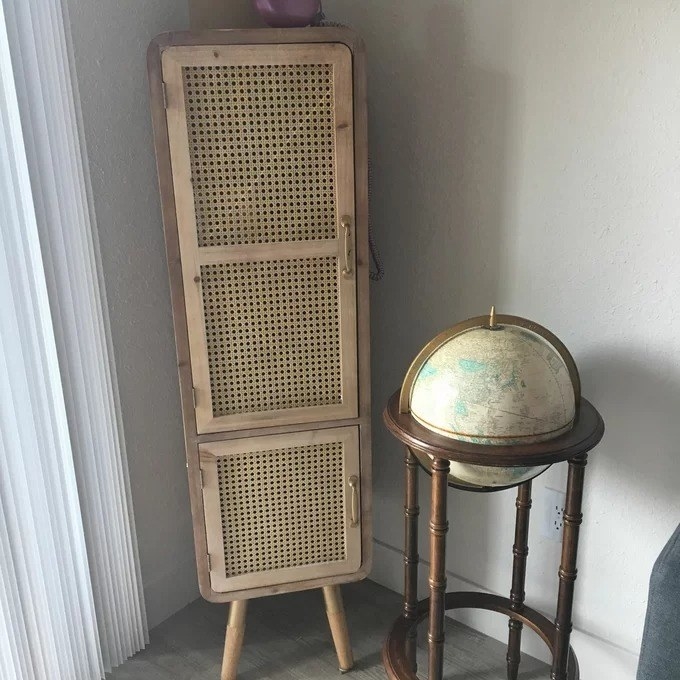 a reviewer photo of the wooden cabinet