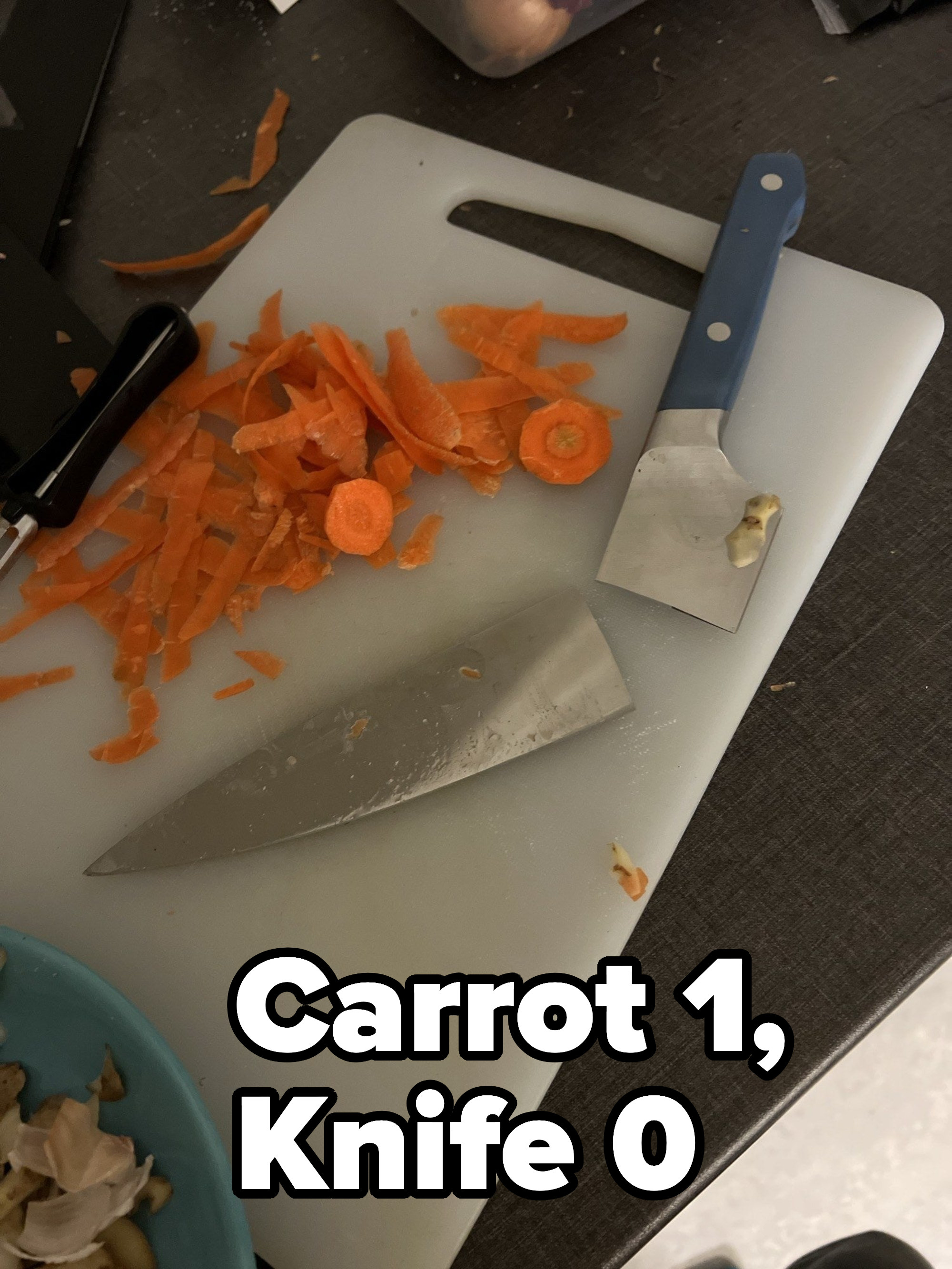 knife broken at the blade by cutting into a carrot