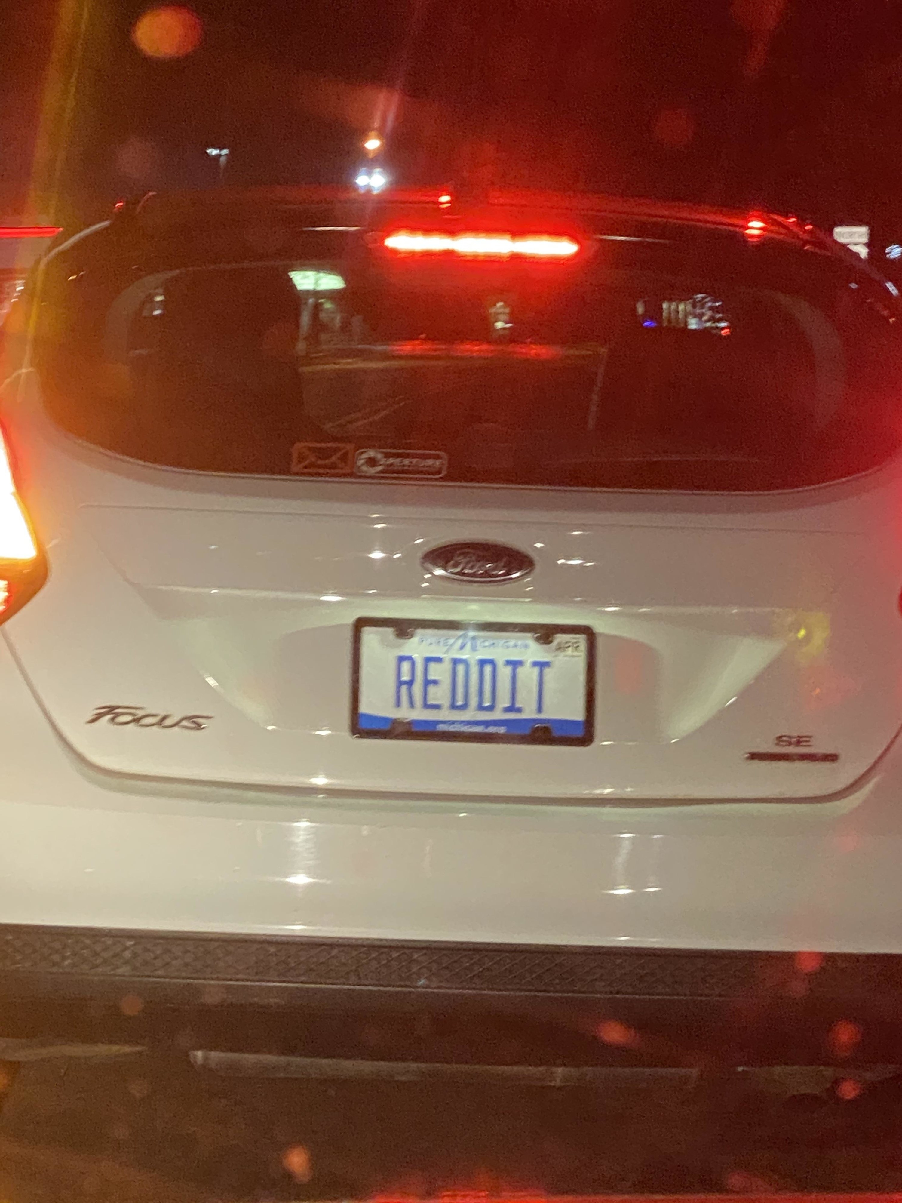 Car with license plate reading &quot;REDDIT&quot;