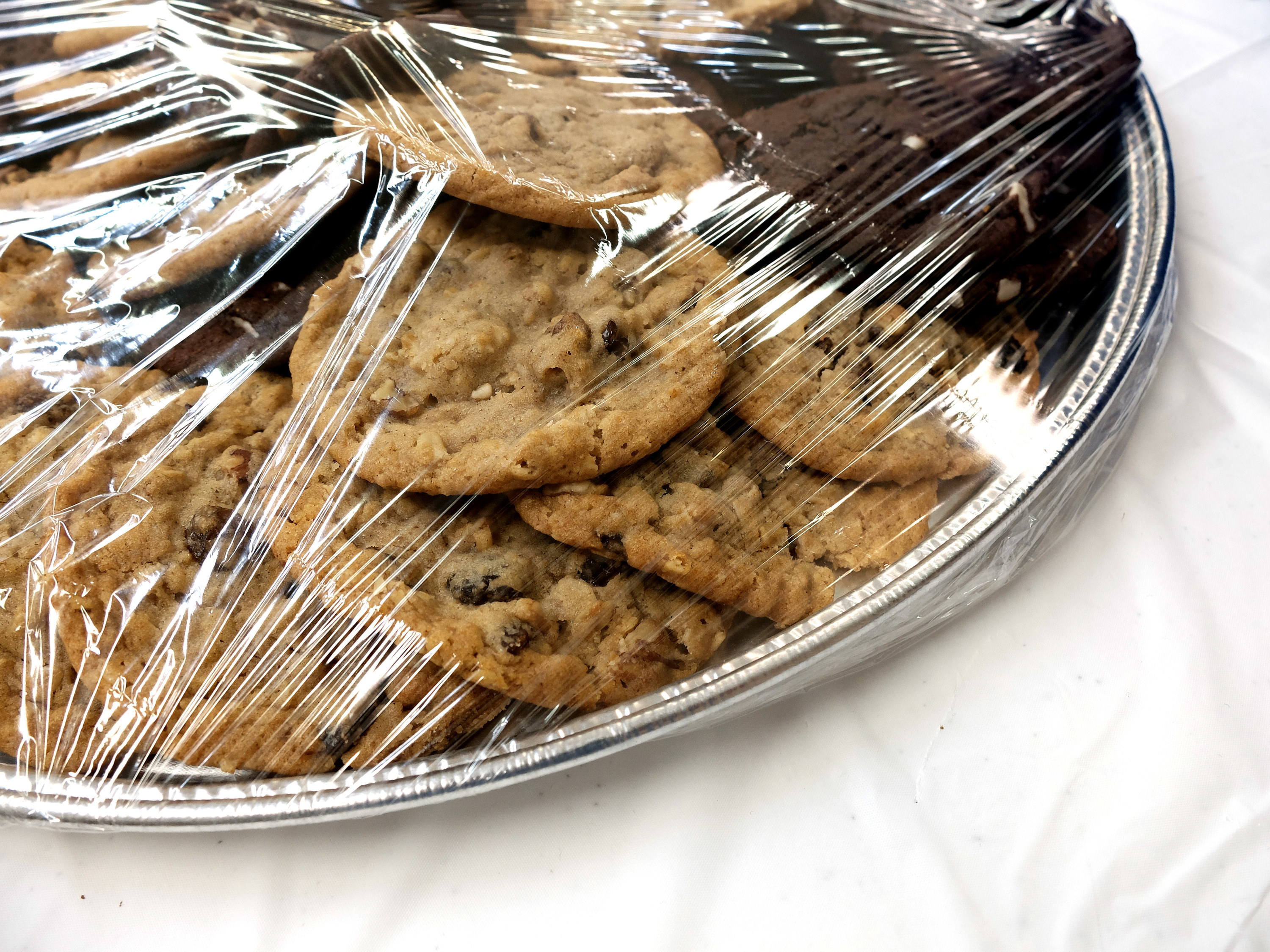 Plastic wrap on a plate of cookies