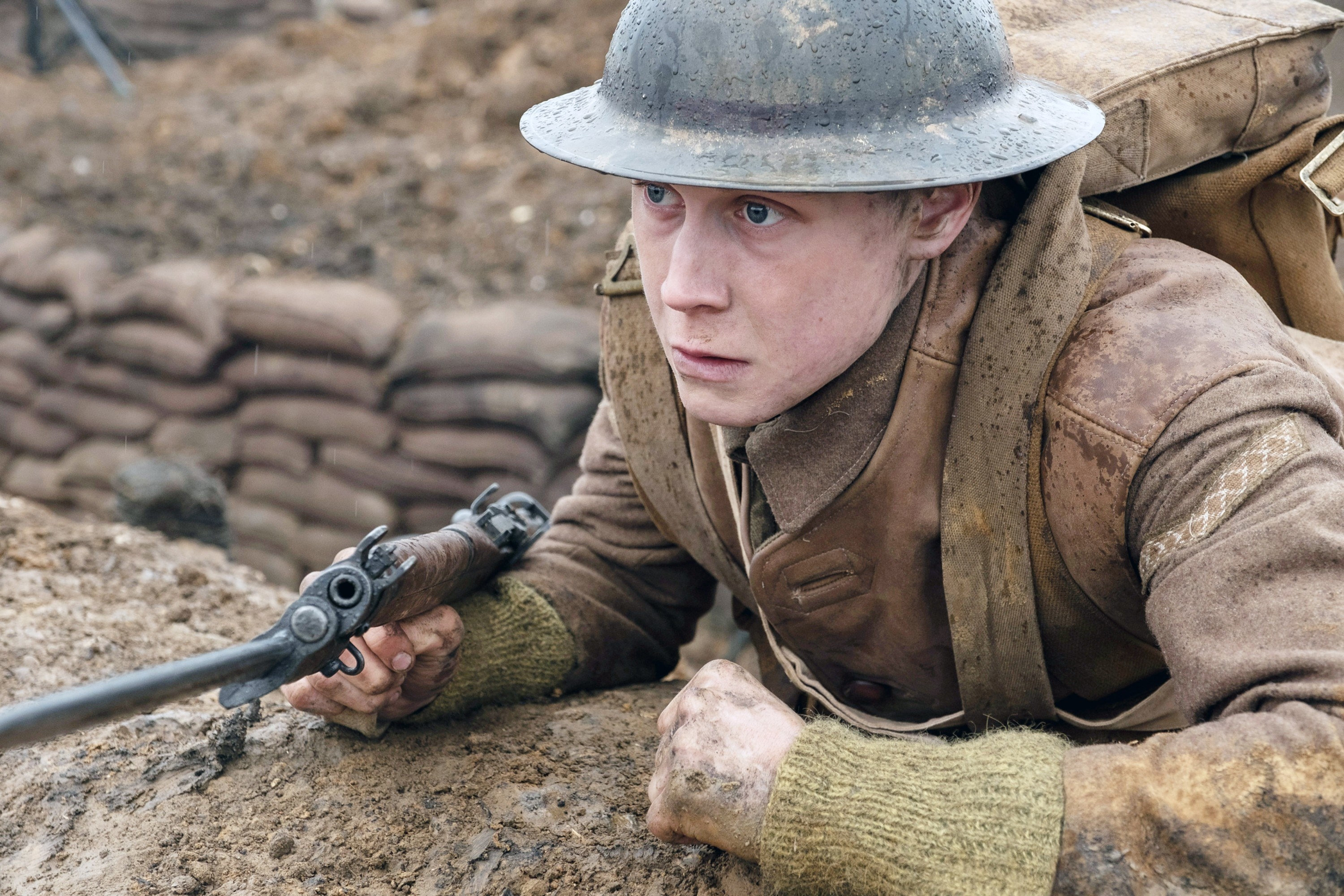 George MacKay lying in a trench.
