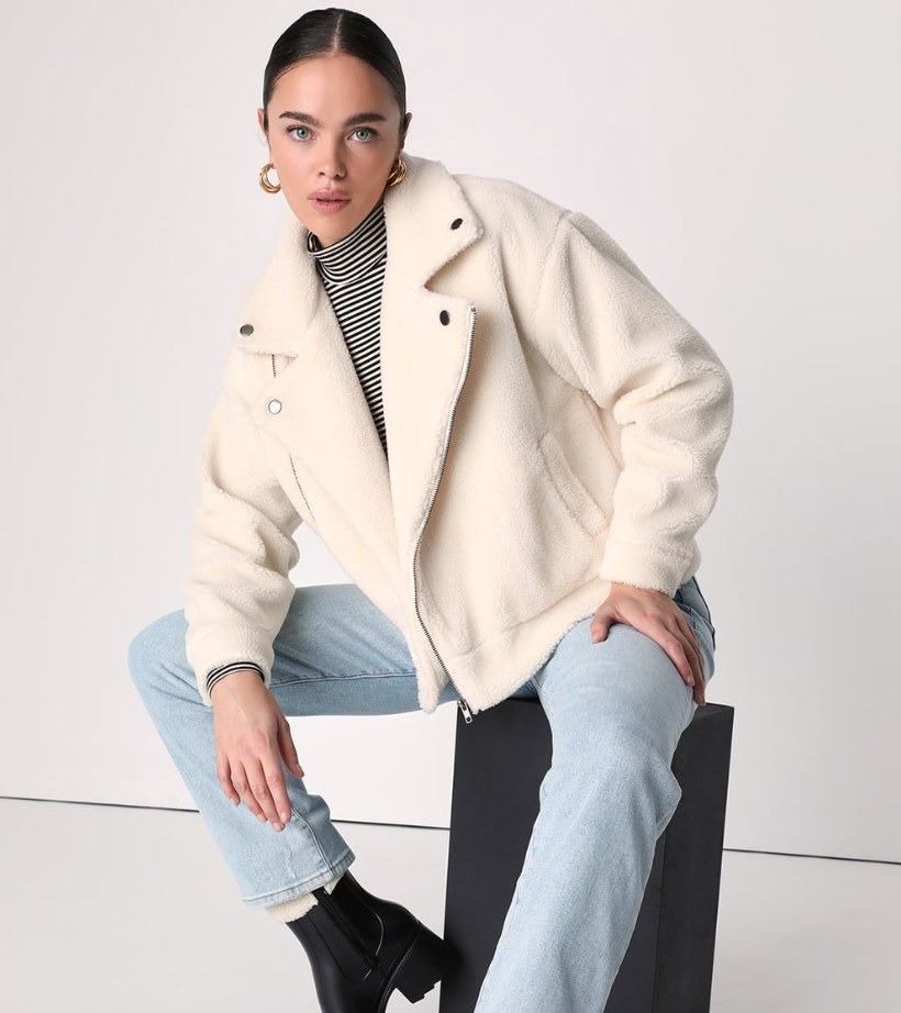 model wearing the white moto shearling jacket