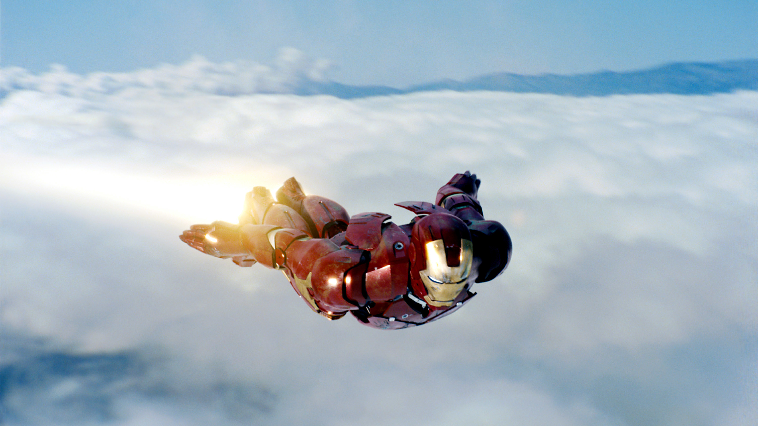 Iron Man flying above the clouds