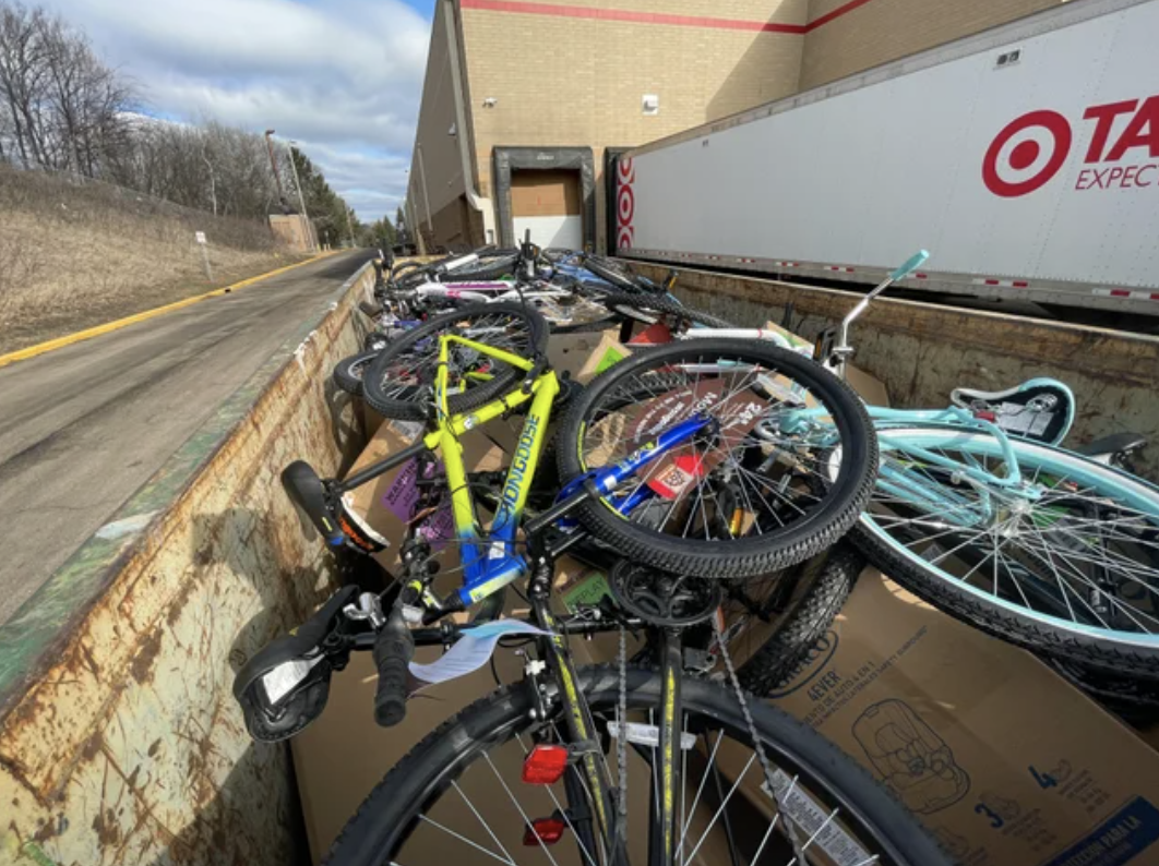 Multiple bikes in a dumpster