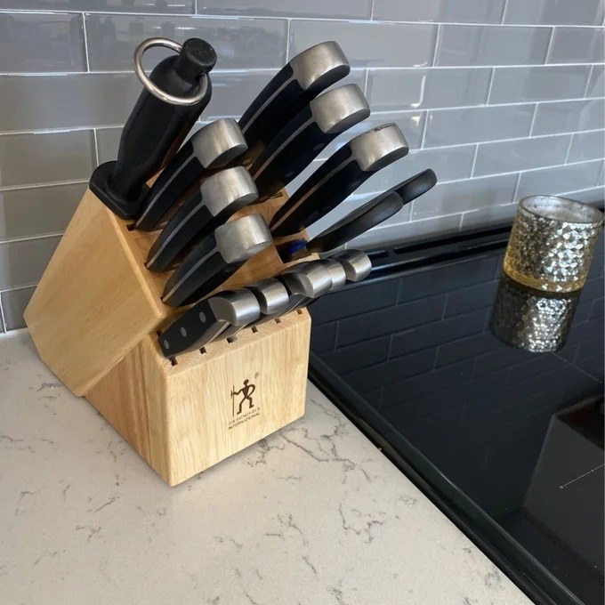 a reviewer photo of the knife block and knives