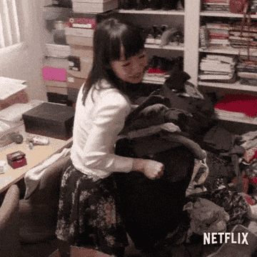 Marie Kondo helping to tidy up someone&#x27;s room.