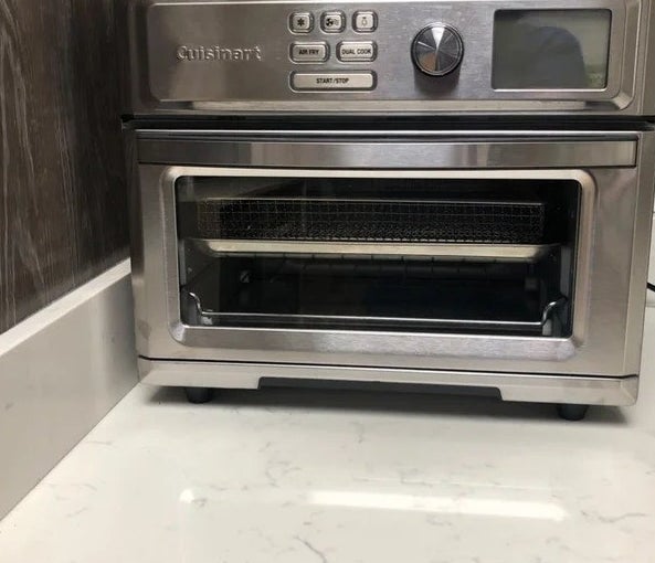 a reviewer photo of the stainless steel air fryer toaster oven