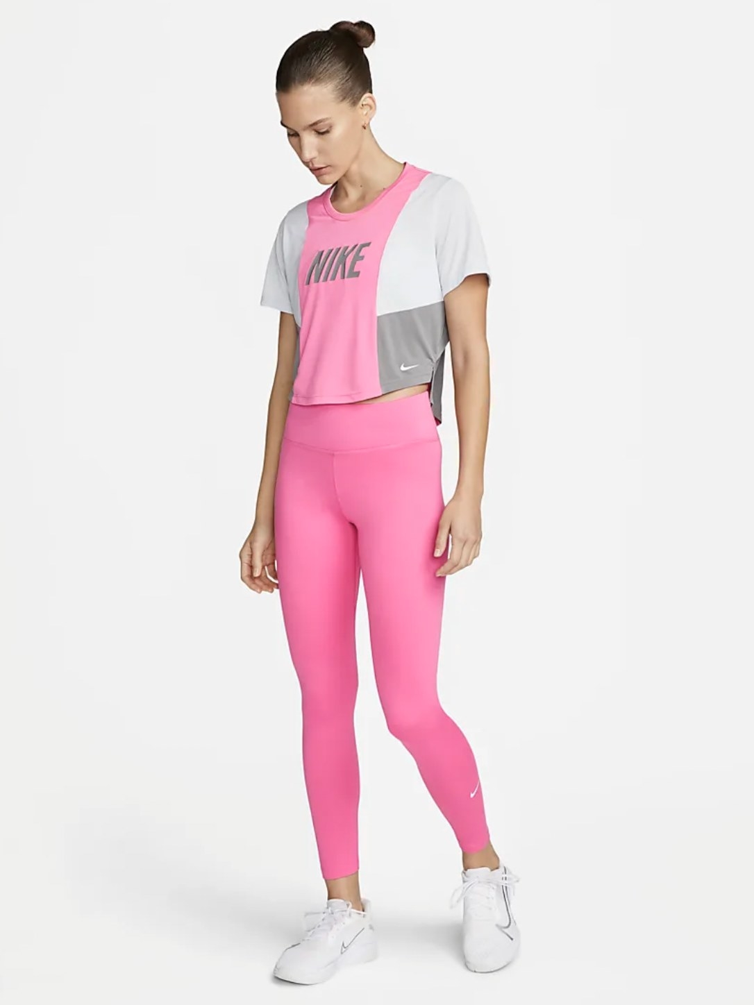 Model in the pink athletic tights