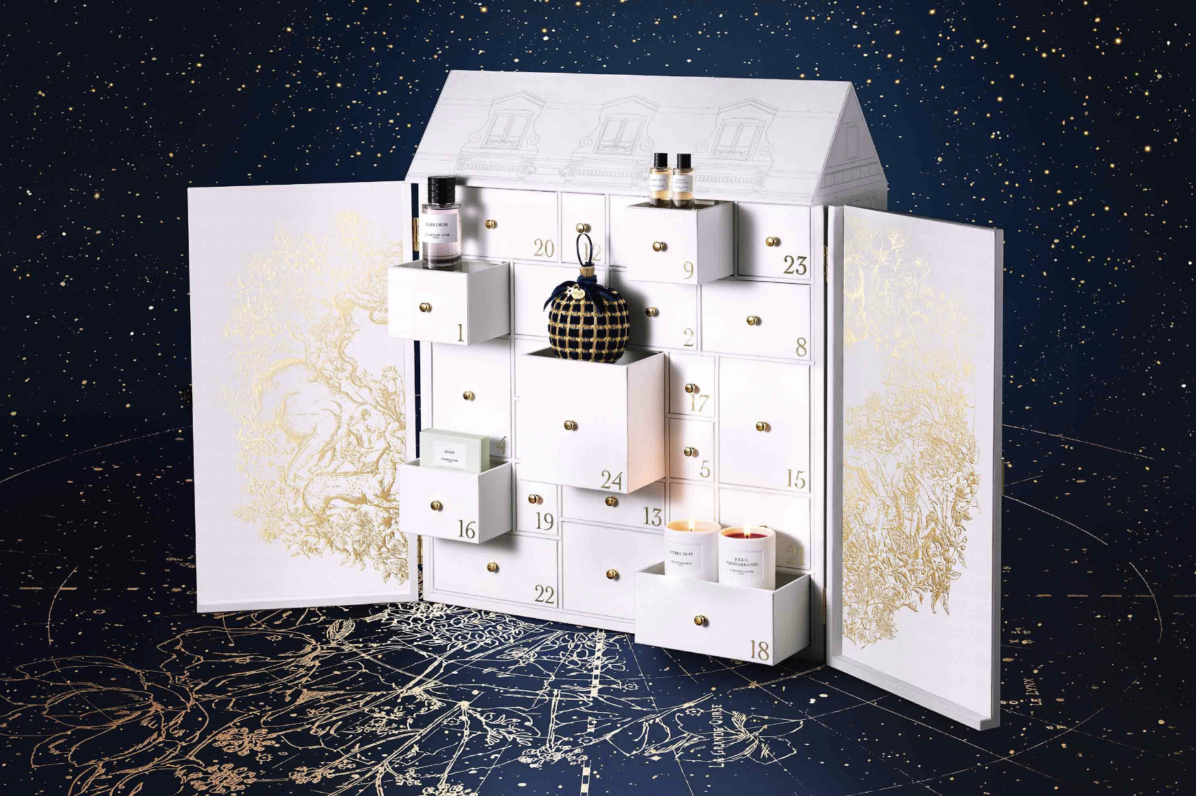 The advent calendar includes differently sized drawers for each day, with each drawer holding a different item