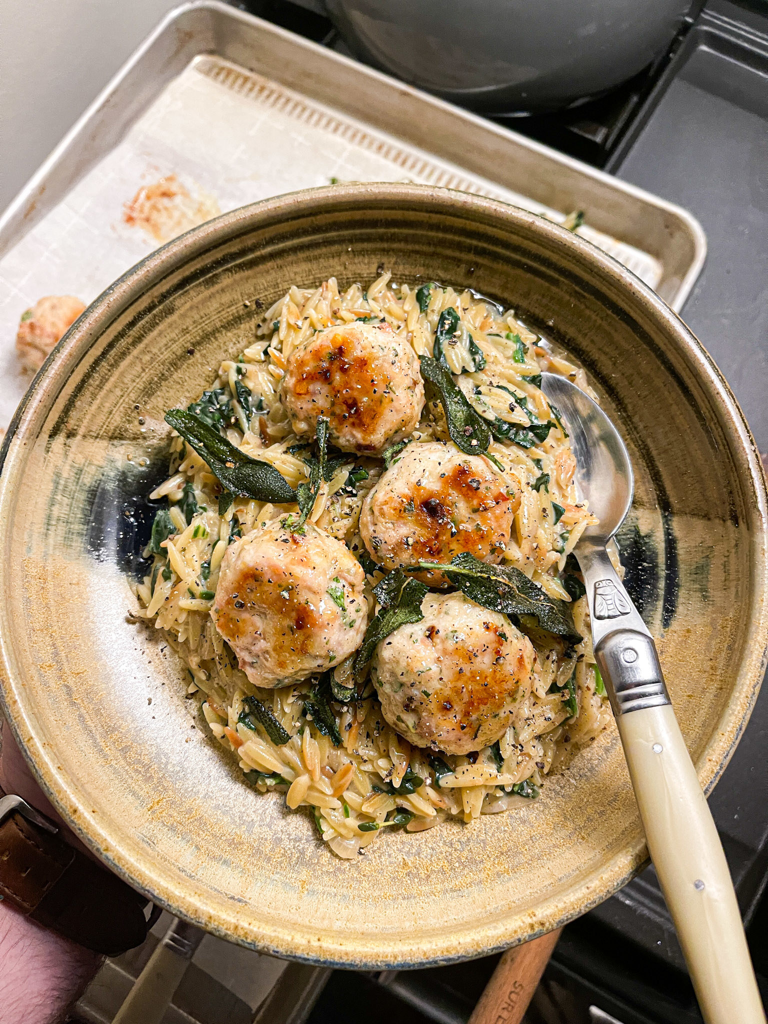creamy orzo with chicken meatballs on top