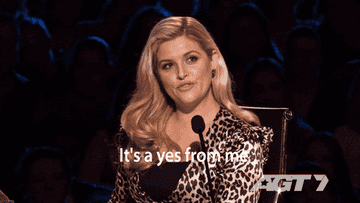 Lucy Durack saying it&#x27;s a yes from me into a microphone