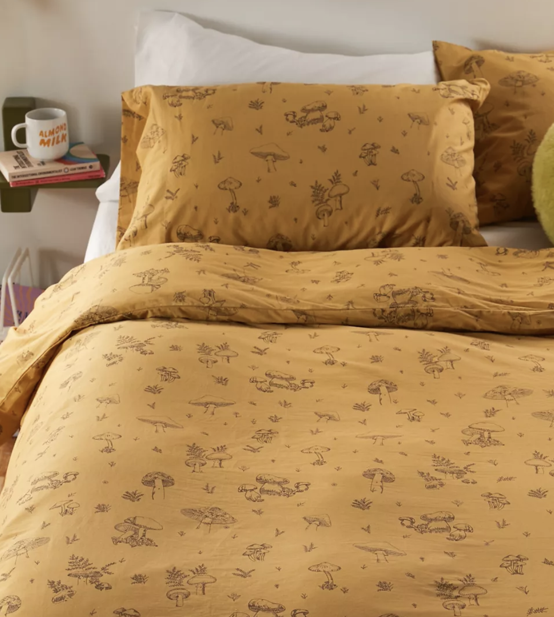 a duvet cover set with mushrooms on it