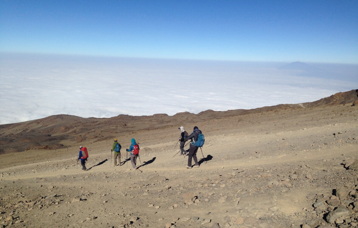 Climbers hiking down Mt Kilimanjaro