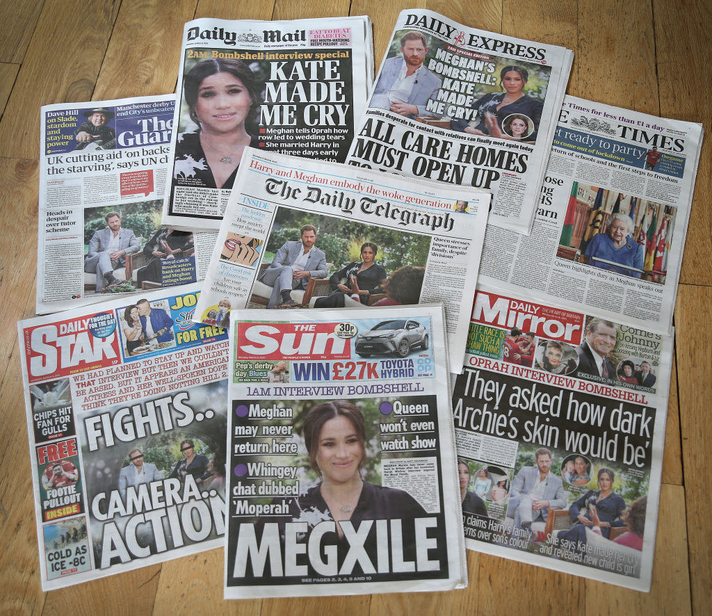 UK newspaper headlines about the interview, including &quot;Megxile&quot; and &quot;They Asked How Dark Archie&#x27;s Skin Would Be&quot;