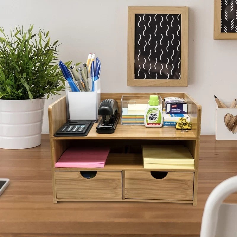 the desk organizer with office supplies on it