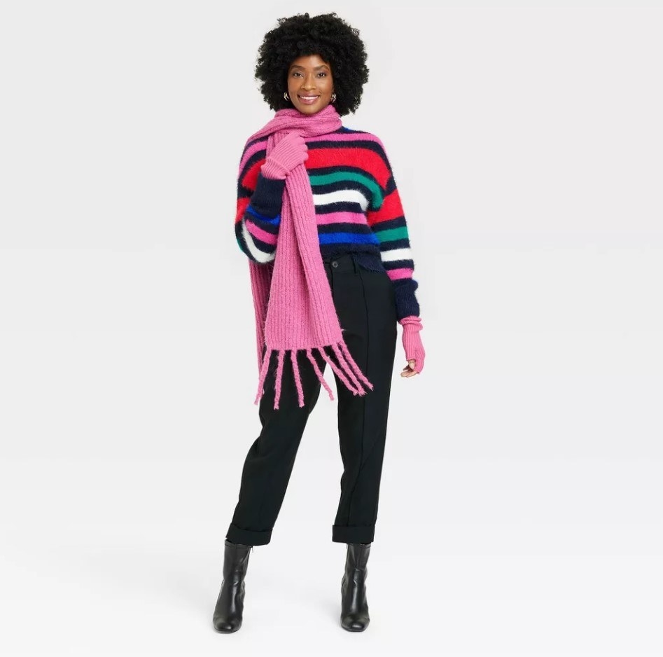 colorful striped sweater on model