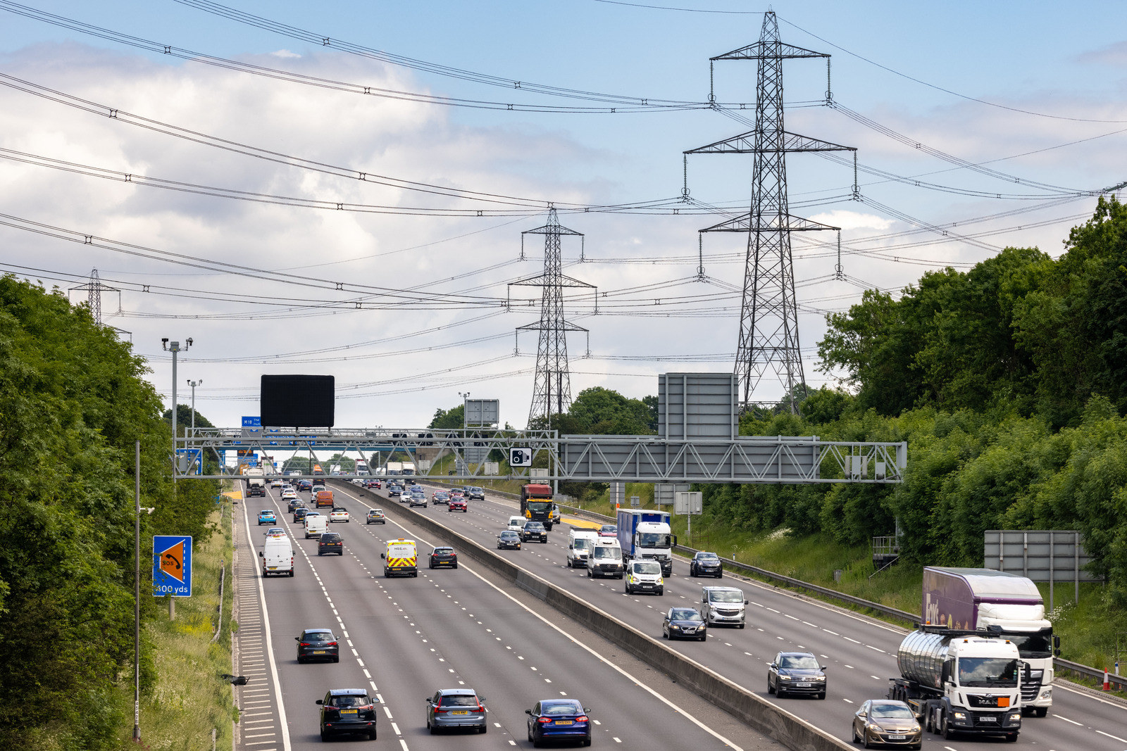 Aerial view of a Smart Motorway with cars and lorries driving on it