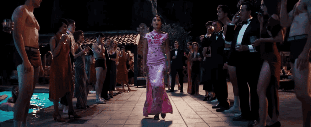 Movie gif: Li Jun Li in a pink floral floor-length cheongasm