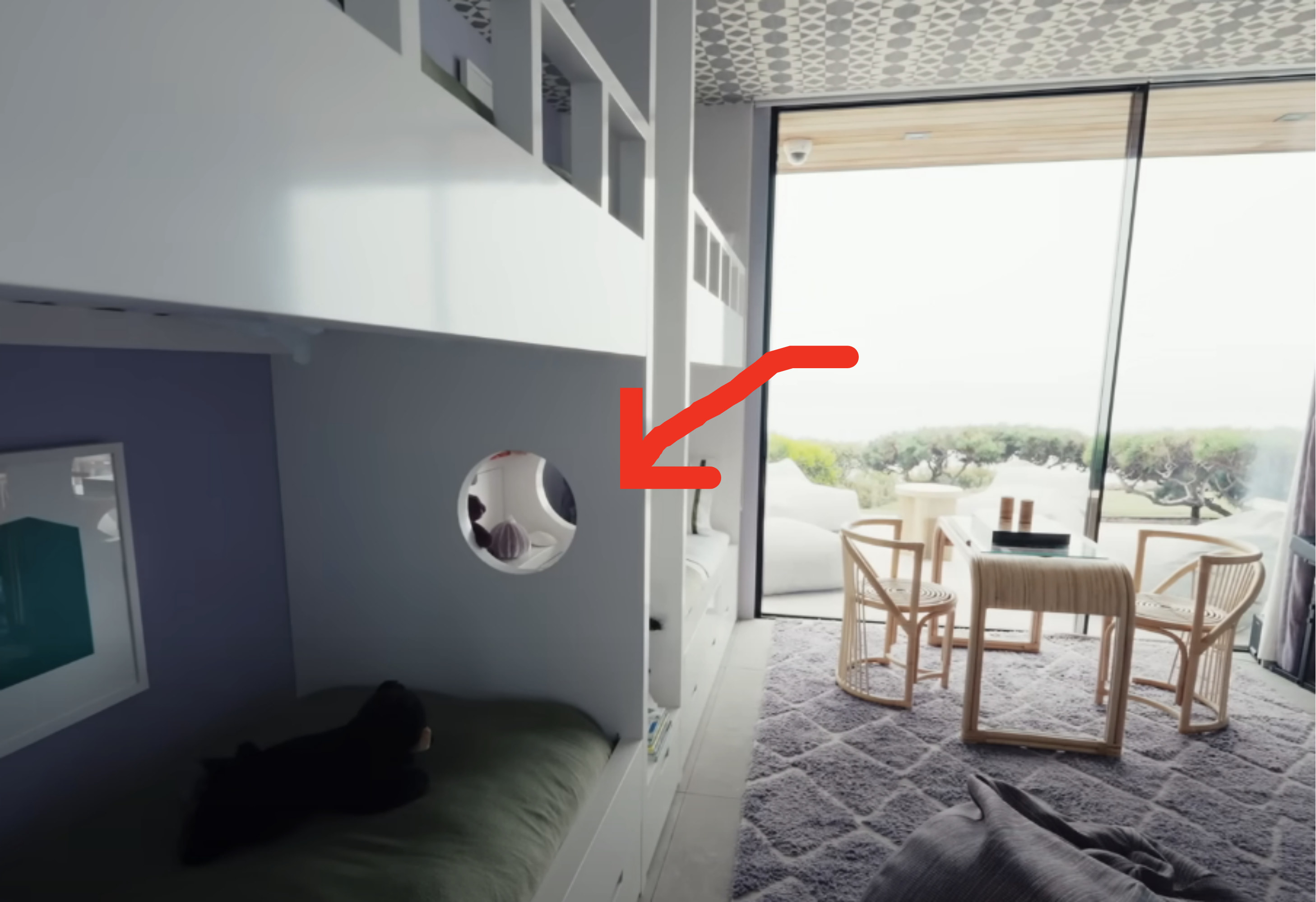 arrow pointing to cut out window in the bunks