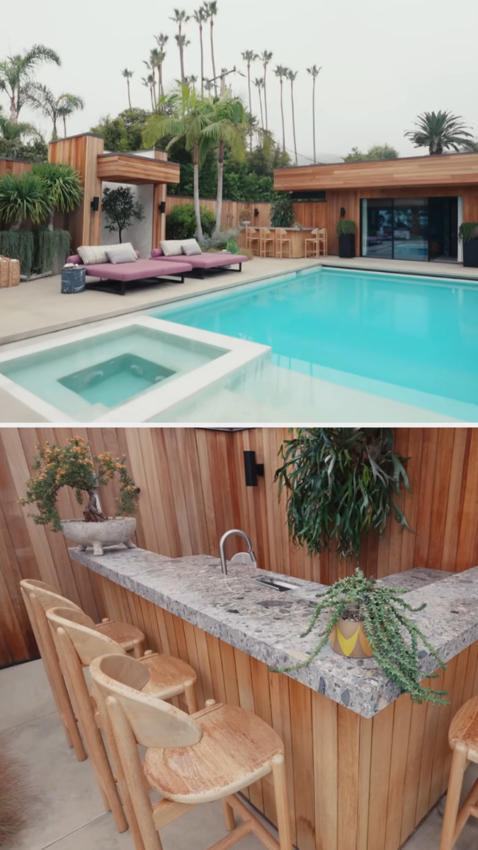 large swimming pool with natural wood and marble outdoor bar