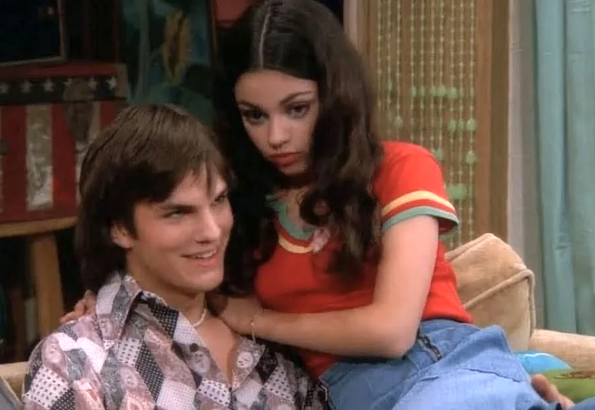 Jackie sitting on Kelso&#x27;s lap