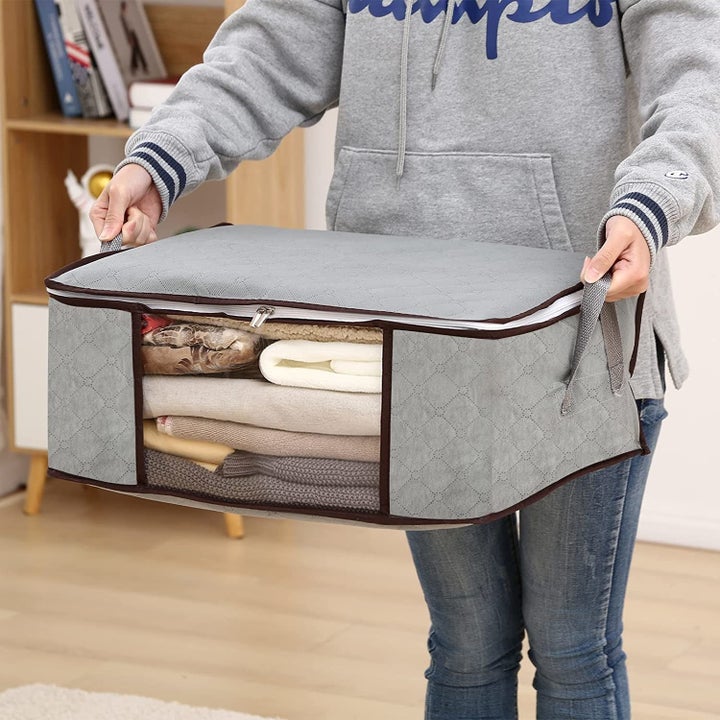 a model holding one storage bag