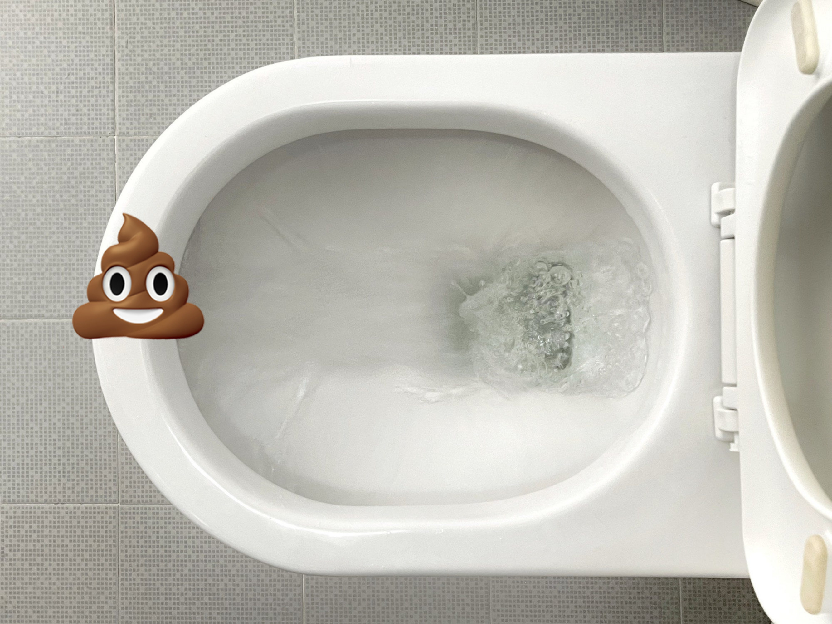 A poop emoji on a toilet