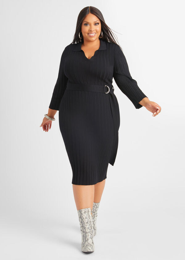 model in black ribbed knit midi dress with a belt, collar, and long sleeves