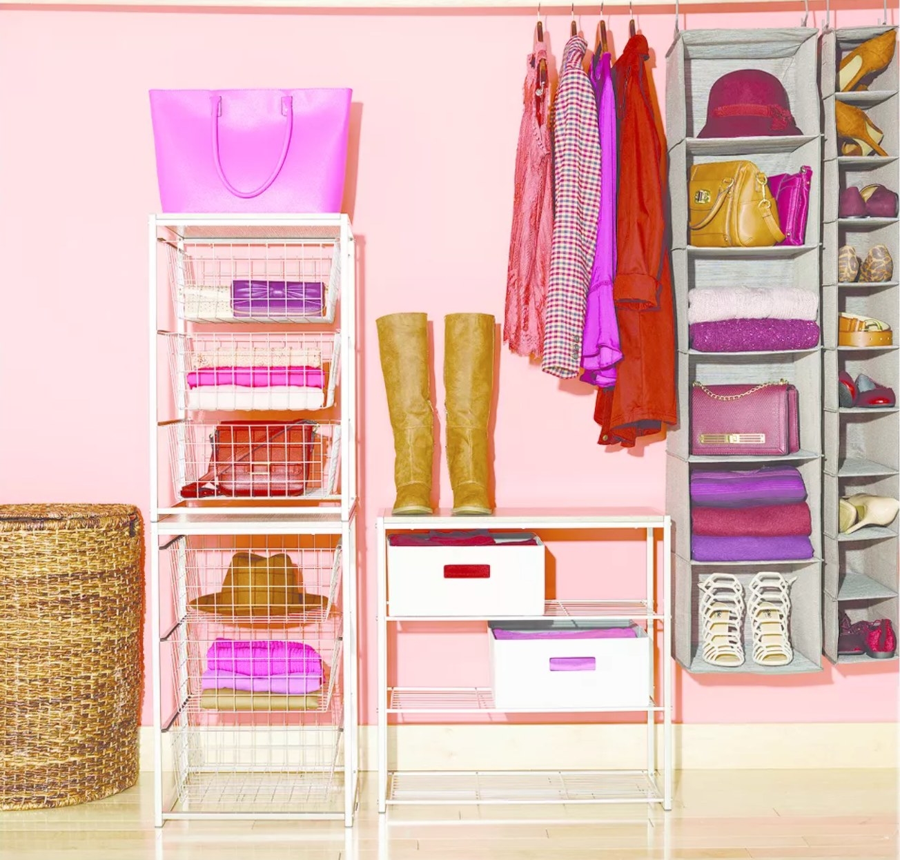 a very organized, very pink closet, with the grey hanging organizer on the right of the image