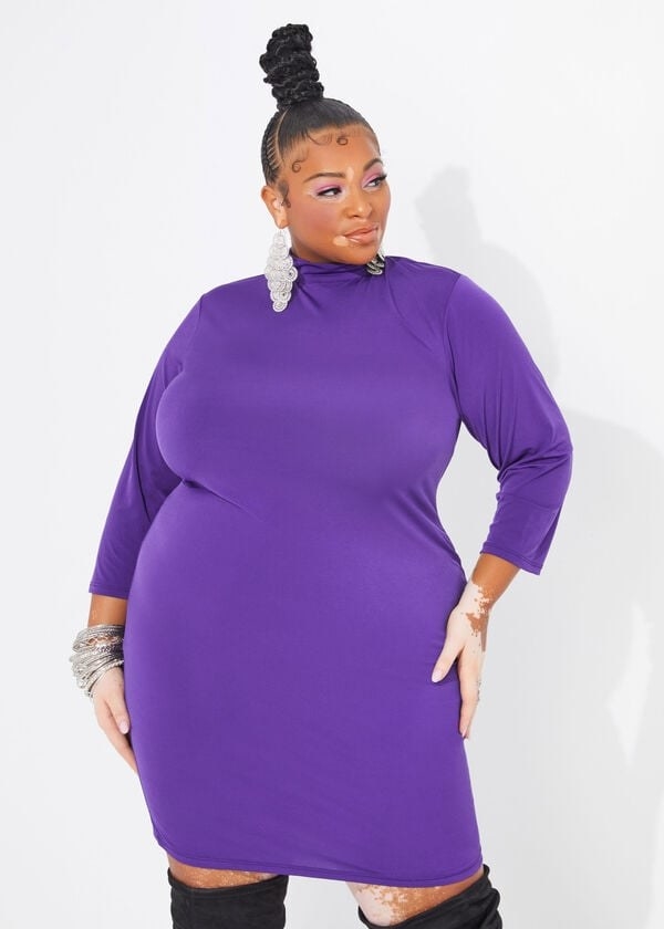 model in purple mock neck long sleeve mini dress
