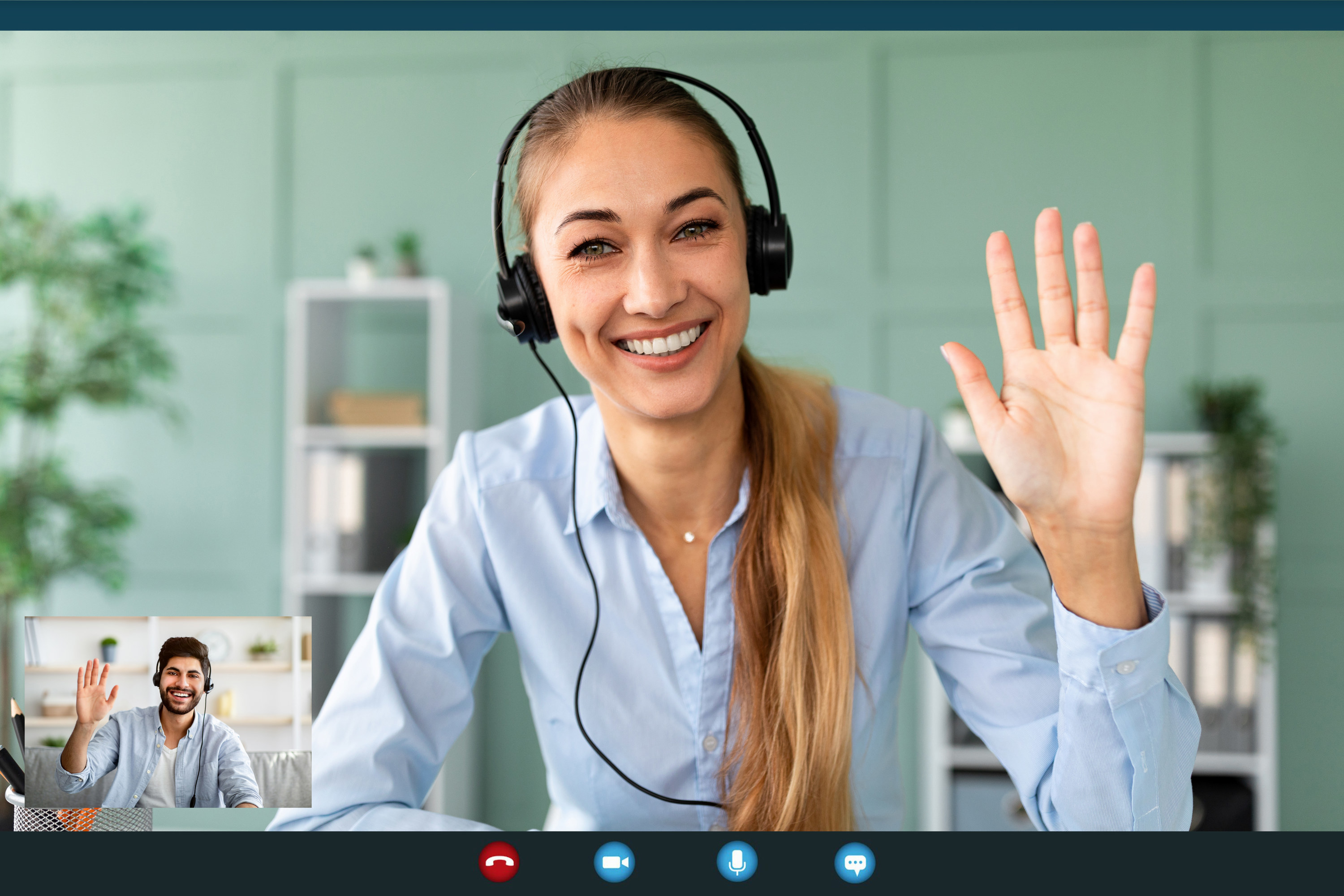 Woman waving hello in a virtual interview
