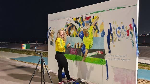 Vancouver artist Carling Jackson made history when she became the first-ever sports artist to paint at the 2022 FIFA World Cup, creating murals at several games