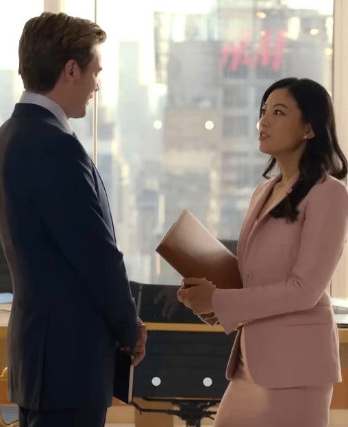 two lawyers talk in the boardroom in "partner track"