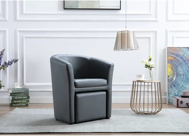 Chair next to side table on rug