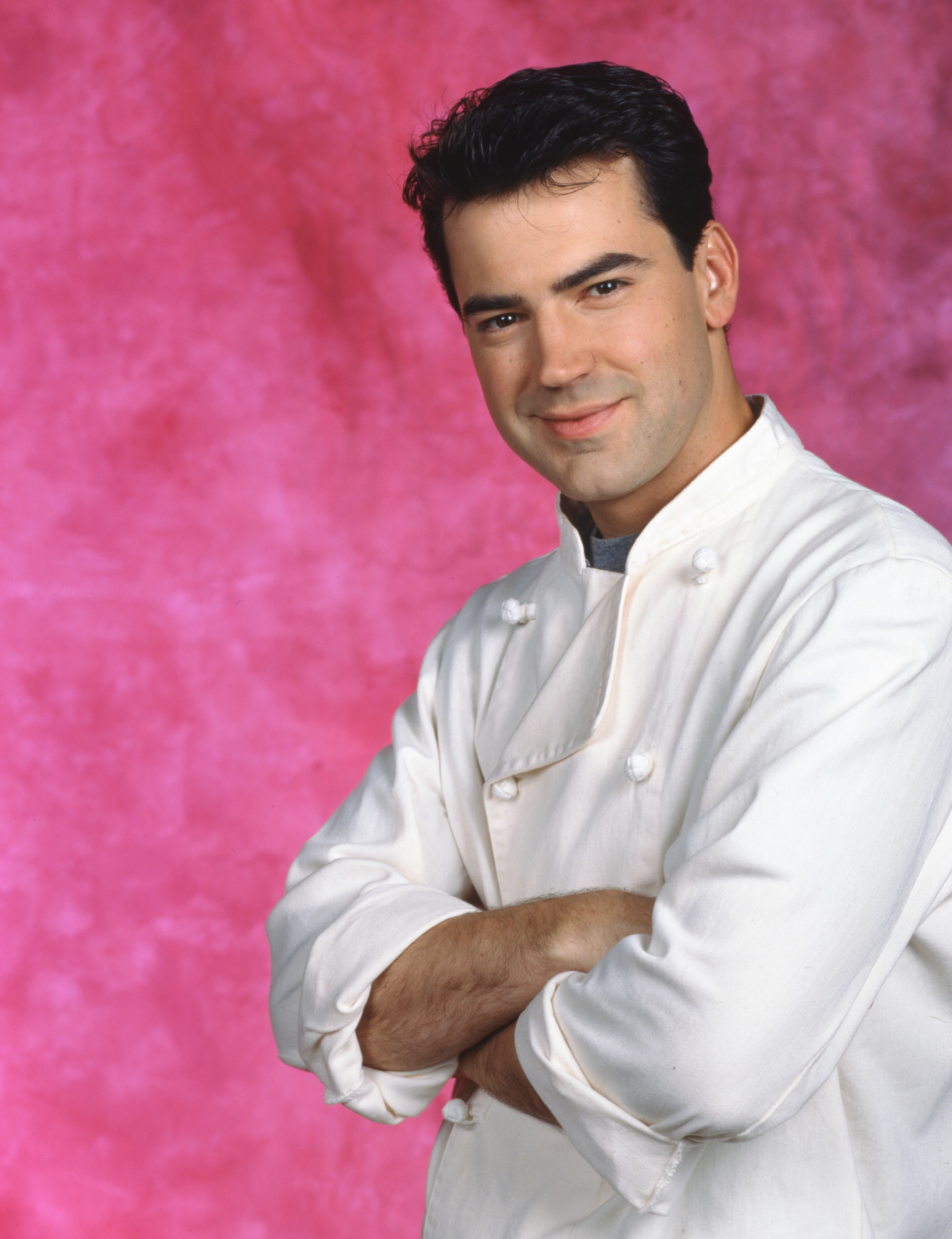 Ron Livingston smiling in a chef&#x27;s jacket in a soap opera photo