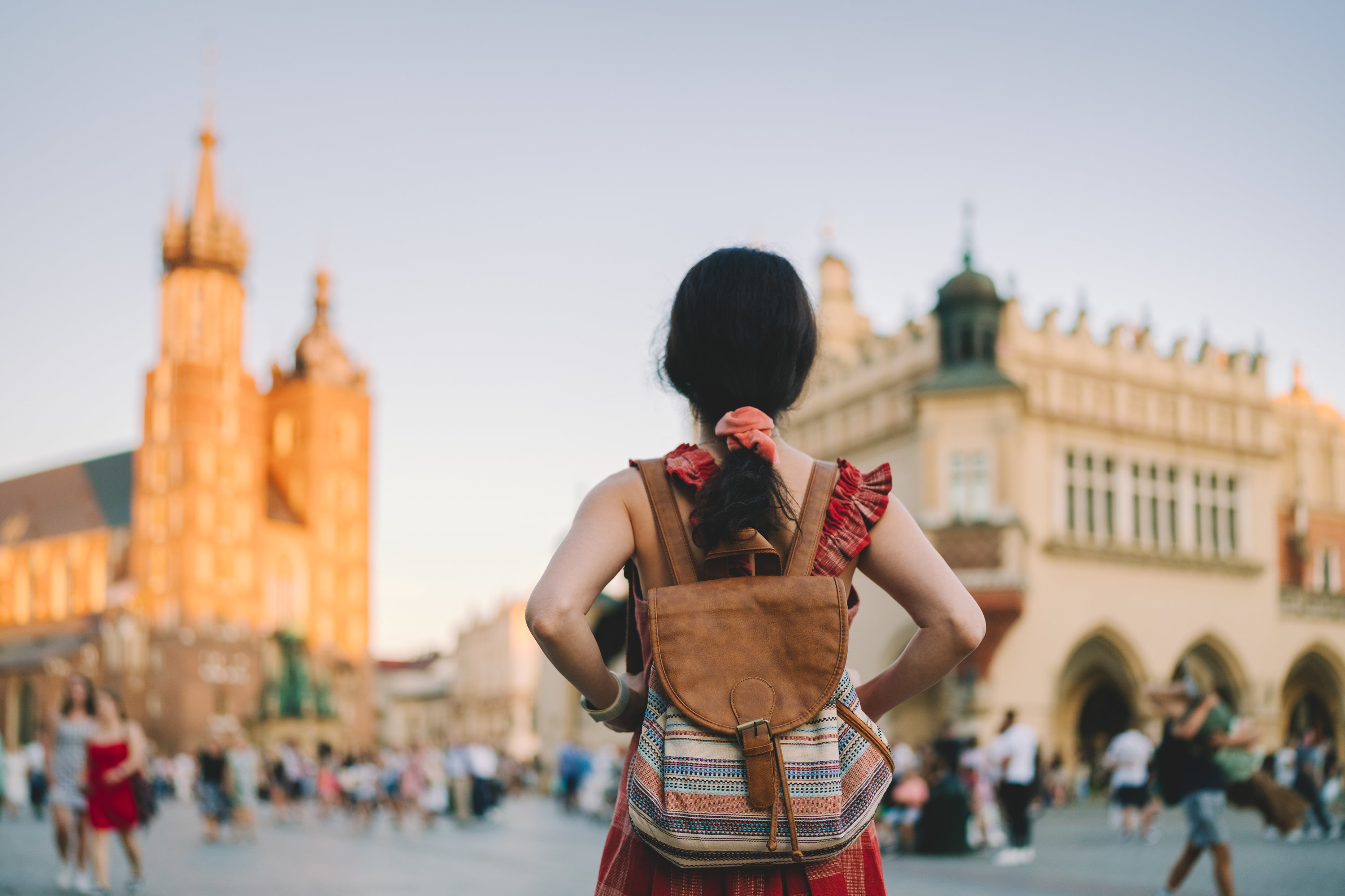 Woman with backpack on in Europe