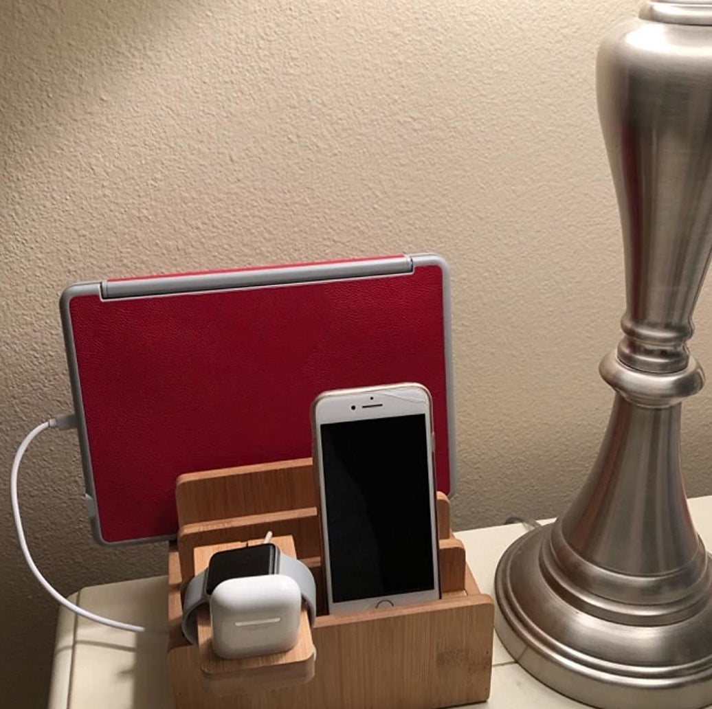 Reviewer image of charging station with various devices in it