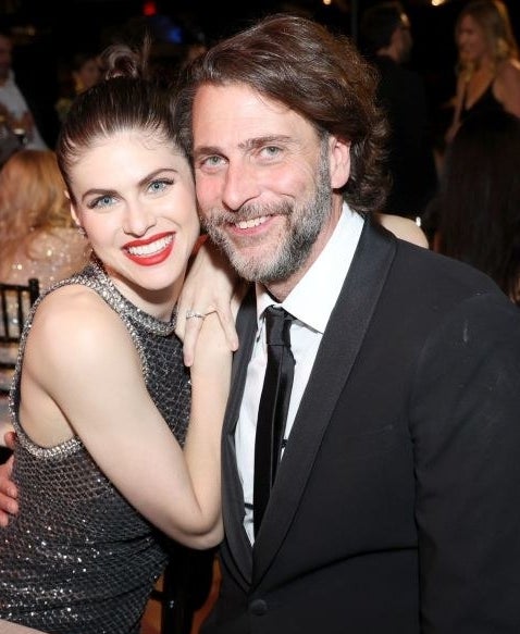 Alexandra Daddario and Andrew Form smiling and embracing